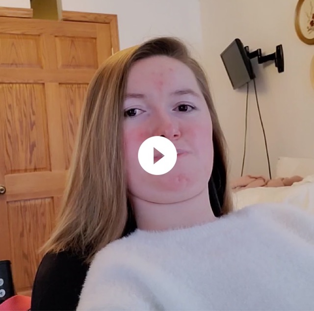 Thumbnail of a video of Brianna talking about creating a magazine for disabled and non-binary people. She sits in her wheelchair in a private area of her home.